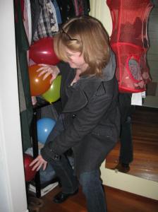 Stuffing ballons in the closet