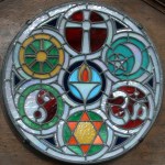 Stained glass roundel, The Unitarian flaming chalice in touch with all faiths Made by Stephen Pask 1999, The Octagon Unitarian Chapel, Norwich, Norfolk, England, UK Photo by Leo Reynolds